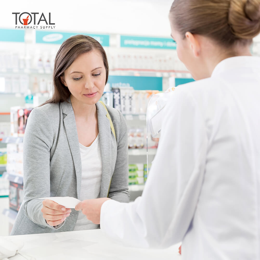 Pharmacist preparing prescriptions